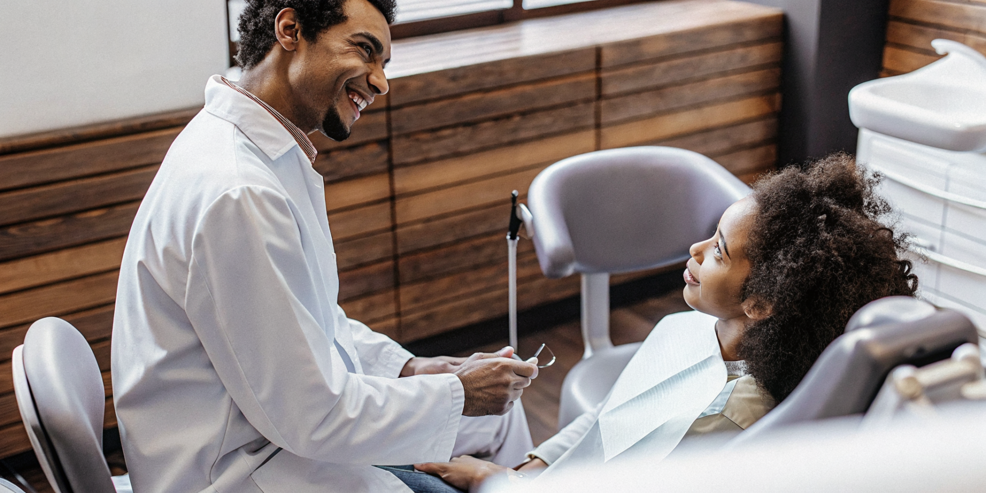 Compassionate dentist consultation with patient at Lowell Family Dental Practice