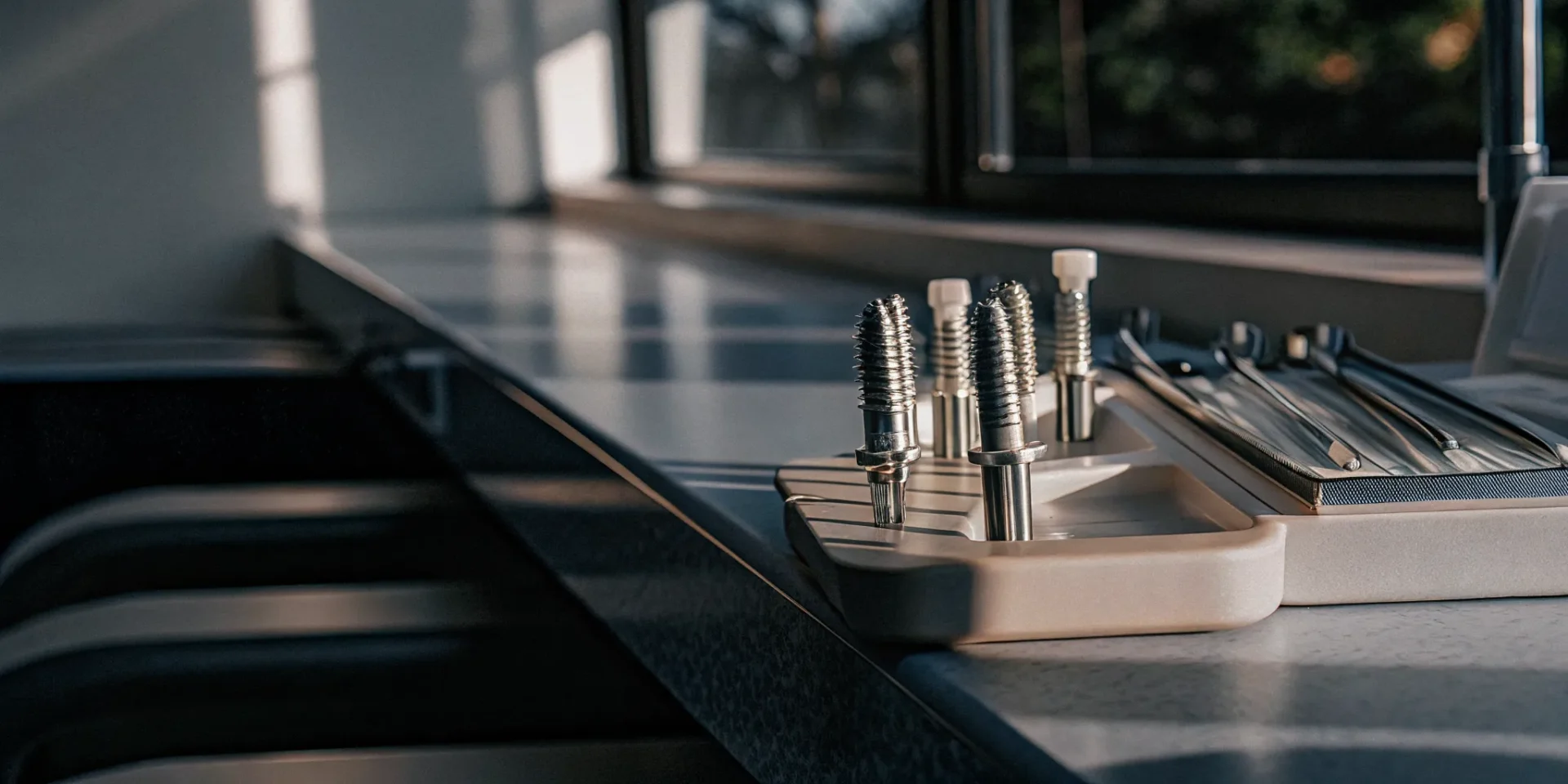 Dental implant model in a modern Lowell dental clinic